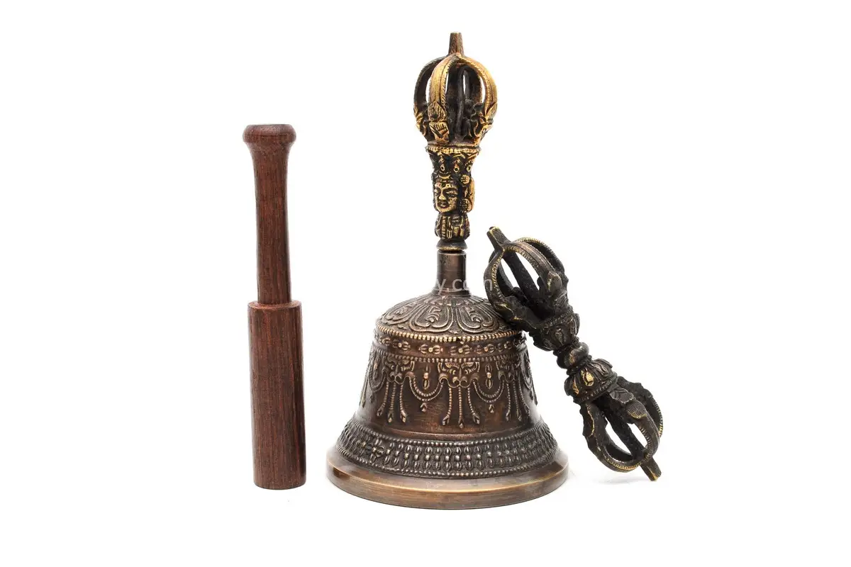 6-Inch Tall Tibetan Bell – handcrafted from a traditional metal alloy with subtle engravings, producing a deep and soothing tone, perfect for meditation, rituals, and spiritual ceremonies.