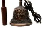 6-Inch Tall Tibetan Bell – handcrafted from a traditional metal alloy with subtle engravings, producing a deep and soothing tone, perfect for meditation, rituals, and spiritual ceremonies.