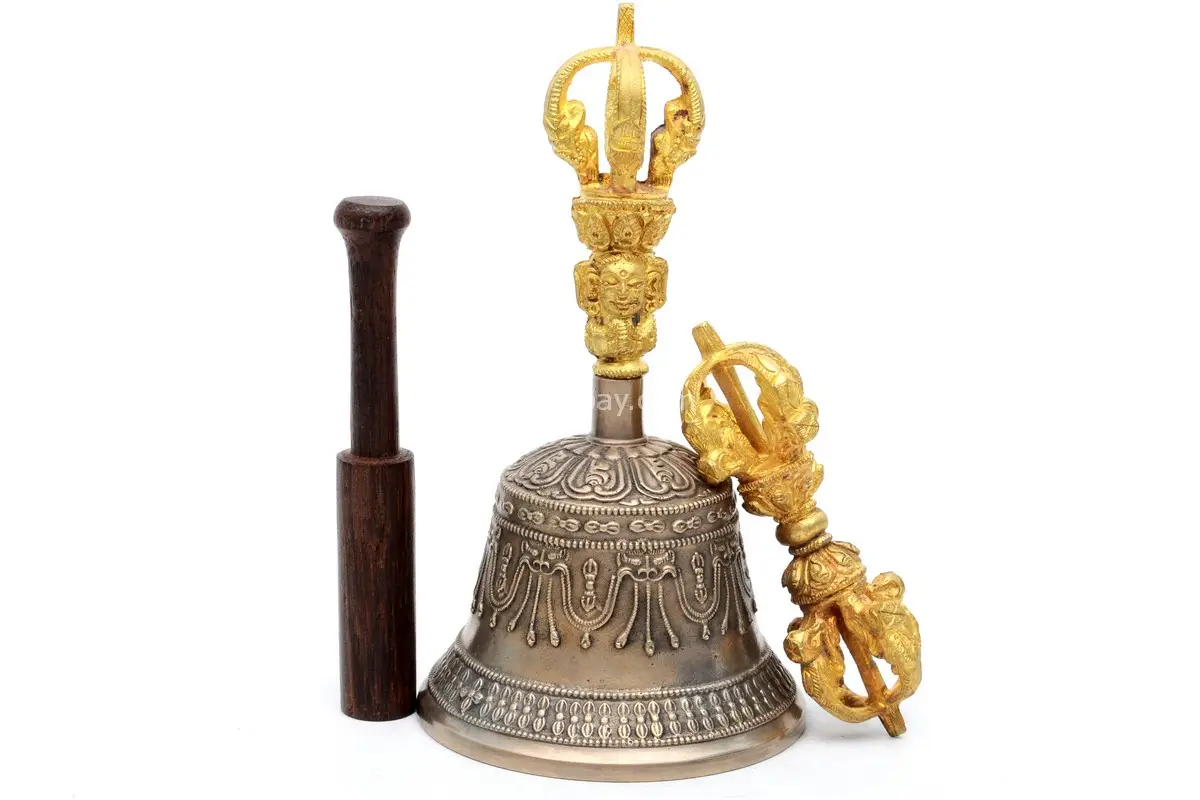 7-Inch Tall Tibetan Bell and Dorje Set – handcrafted from a traditional 7-metal alloy, featuring detailed carvings and a resonant tone, ideal for meditation, rituals, and sound healing.