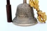 7-Inch Tall Tibetan Bell and Dorje Set – handcrafted from a traditional 7-metal alloy, featuring detailed carvings and a resonant tone, ideal for meditation, rituals, and sound healing.