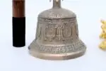 7-inch tall Tibetan Bell and Dorje set – handcrafted from a traditional bronze alloy with detailed engravings, producing rich, resonant sound ideal for meditation, rituals, and sound healing.