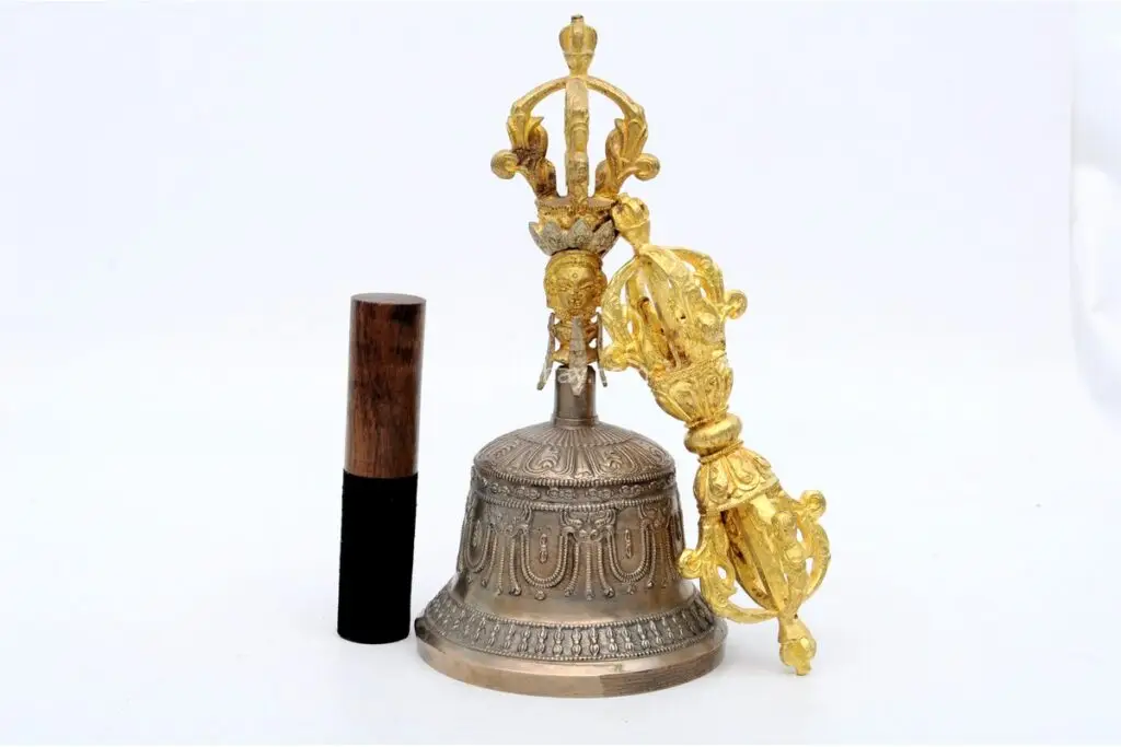 7-inch tall Tibetan Bell and Dorje set – handcrafted from a traditional bronze alloy with detailed engravings, producing rich, resonant sound ideal for meditation, rituals, and sound healing.