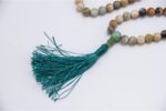 Amazonite Stone Mala – handcrafted 108-bead meditation necklace made with soothing amazonite gemstones, ideal for mantra chanting, spiritual practice, and chakra healing.