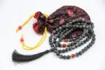 Black Labradorite Mala – handcrafted 108-bead prayer necklace made from natural black labradorite stones, known for grounding energy, protection, and spiritual awakening. Ideal for meditation, chakra healing, and mantra chanting.