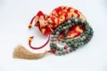 Bloodstone & Carnelian Mala – handcrafted 108-bead prayer necklace made from natural bloodstone and carnelian gemstones, known for boosting energy, courage, and grounding. Ideal for meditation, chakra healing, and spiritual strength.