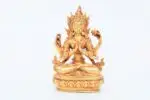 Handcrafted Chenrezig Statue with four arms in a seated posture – made from brass with detailed ornamentation, symbolizing compassion and the embodiment of Avalokiteshvara.