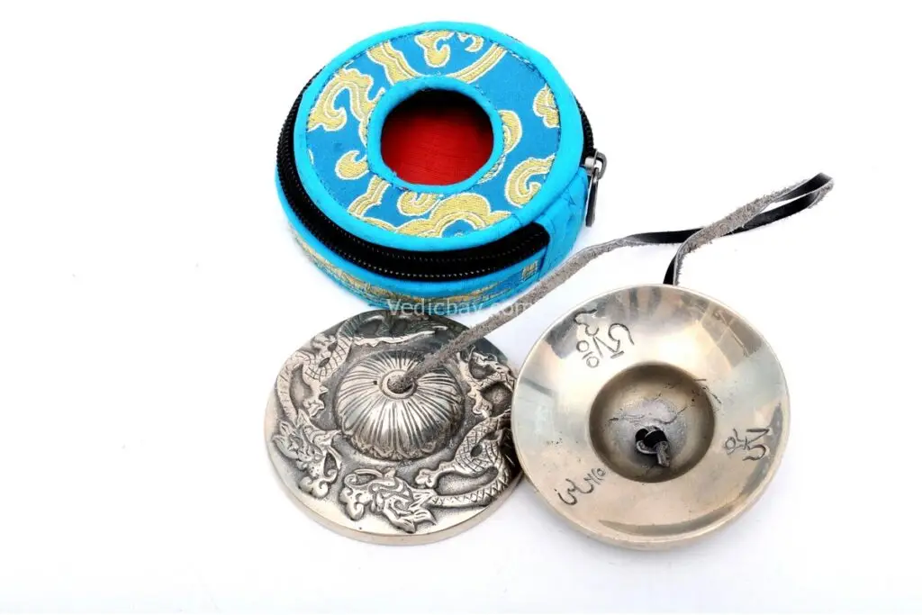 Dragon Embossed Tibetan Chimes – prime quality, handcrafted from 7-metal alloy with intricate dragon designs, producing a powerful and clear tone ideal for meditation, ritual use, and space cleansing.