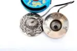 Dragon Embossed Tibetan Chimes – prime quality, handcrafted from 7-metal alloy with intricate dragon designs, producing a powerful and clear tone ideal for meditation, ritual use, and space cleansing.
