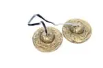 Dragon Embossed Tingsha Cymbals – handcrafted from a traditional 7-metal alloy with detailed dragon engravings, producing a clear, high-pitched tone ideal for meditation, energy clearing, and spiritual rituals.