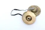 Dragon Embossed Tingsha Cymbals – handcrafted from a traditional 7-metal alloy with detailed dragon engravings, producing a clear, high-pitched tone ideal for meditation, energy clearing, and spiritual rituals.