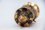 Tibetan mantra prayer wheel with embossed Om Mani Padme Hum