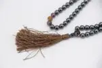 Hematite, Amethyst & Picture Jasper Prayer Beads – handcrafted 108-bead mala combining grounding hematite, calming amethyst, and earthy picture jasper for balance, clarity, and emotional healing. Ideal for meditation and spiritual practice.