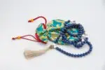 Lapis, Conch Shell & Crystal Mala – handcrafted 108-bead prayer necklace combining lapis lazuli for wisdom, conch shell for purity, and crystal quartz for clarity and spiritual energy. Ideal for meditation, mantra chanting, and chakra alignment.