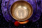 Extra large handmade singing bowl featuring Buddha Foot in center, mantra etching, and Eight Auspicious Symbols