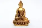 Handcrafted Medicine Buddha Statue holding a healing bowl – made from brass with detailed carvings, symbolizing health, healing, and compassion, ideal for meditation and wellness spaces.