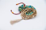 Old Conch Shell Mala – handcrafted 108-bead prayer necklace made from aged conch shells, symbolizing sacred sound, purity, and spiritual transformation. Ideal for mantra chanting, deep meditation, and traditional rituals.
