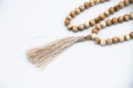 Old Conch Shell Mala – handcrafted 108-bead prayer necklace made from aged conch shells, symbolizing sacred sound, purity, and spiritual transformation. Ideal for mantra chanting, deep meditation, and traditional rituals.