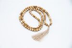 Old Conch Shell Mala – handcrafted 108-bead prayer necklace made from aged conch shells, symbolizing sacred sound, purity, and spiritual transformation. Ideal for mantra chanting, deep meditation, and traditional rituals.