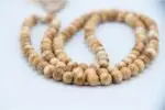 Old Conch Shell Mala – handcrafted 108-bead prayer necklace made from aged conch shells, symbolizing sacred sound, purity, and spiritual transformation. Ideal for mantra chanting, deep meditation, and traditional rituals.