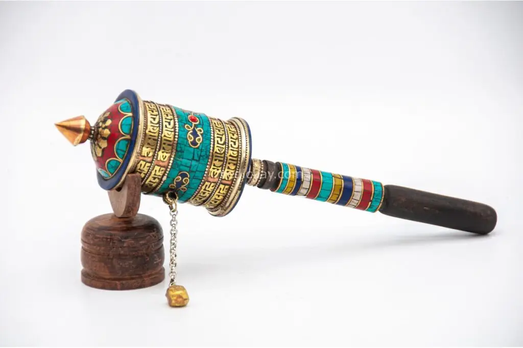 Handcrafted Tibetan Dharma wheel with colorful stones from Nepal