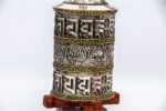 White metal prayer wheel with embossed eight auspicious symbols from Nepal
