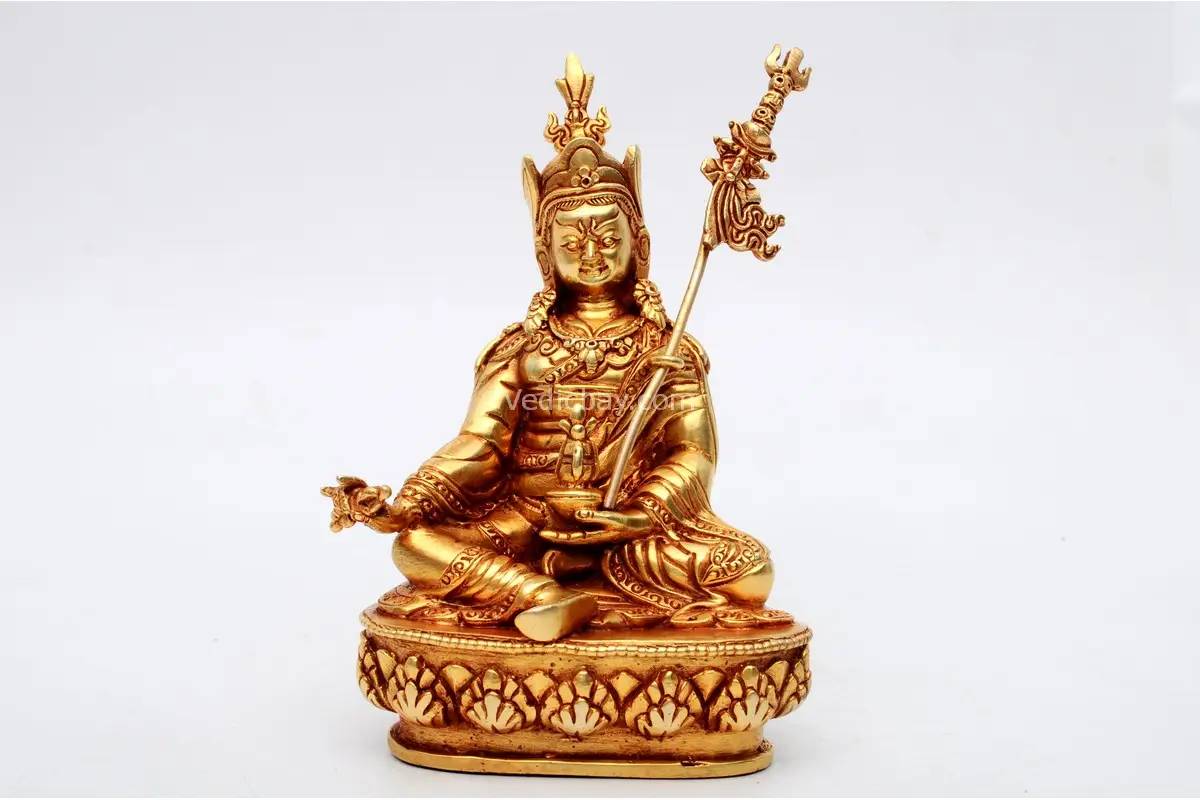 Handcrafted Padmasambhava (Guru Rinpoche) Statue seated in royal posture – made from brass with intricate detailing, holding vajra and skull cup, symbolizing spiritual power and transformation.