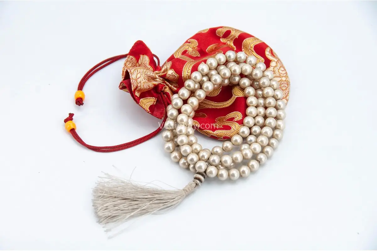 pearl-mala-108-prayer-beads Pearl Mala – handcrafted 108-bead prayer necklace made from natural pearls, symbolizing purity, wisdom, and inner peace. Ideal for meditation, mantra chanting, spiritual rituals, and calming the mind.