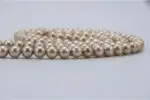 Pearl Mala – handcrafted 108-bead prayer necklace made from natural pearls, symbolizing purity, wisdom, and inner peace. Ideal for meditation, mantra chanting, spiritual rituals, and calming the mind.