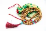 Picture Jasper, Coral & Turquoise Mala – handcrafted 108-bead prayer necklace combining grounding picture jasper, energizing coral, and protective turquoise for balance, vitality, and spiritual harmony. Ideal for meditation and healing rituals.