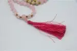 Rose Quartz Mala – handcrafted 108-bead prayer necklace made from natural rose quartz gemstones, symbolizing love, compassion, and emotional healing. Ideal for meditation, heart chakra work, and spiritual rituals.