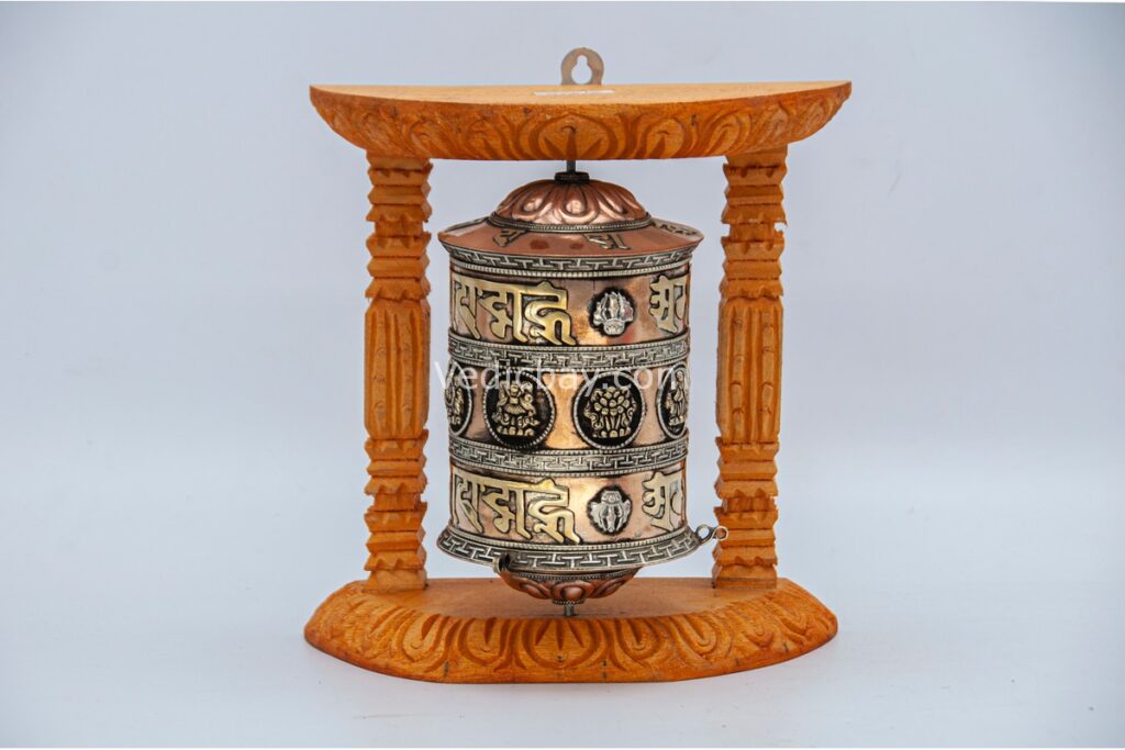 “8-inch wall hanging Tibetan prayer wheel with wooden frame and Austamangal symbol, handmade in Nepal”
