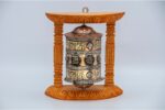 “8-inch wall hanging Tibetan prayer wheel with wooden frame and Austamangal symbol, handmade in Nepal”