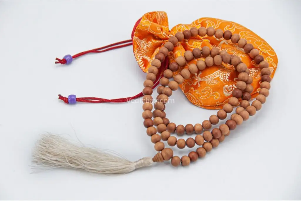 Sandalwood Mala – handcrafted 108-bead prayer necklace made from fragrant natural sandalwood, known for promoting calm, devotion, and inner peace. Ideal for meditation, prayer, and spiritual focus.