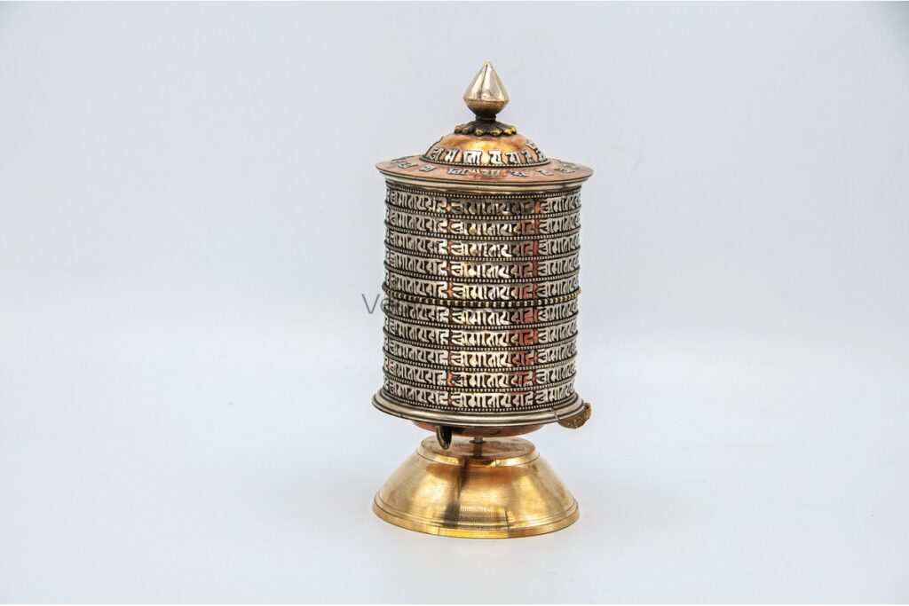 Tibetan Prayer Wheel placed on altar for meditation and spiritual blessings