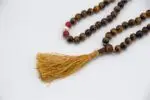 Discover our carefully handcrafted mala collection, featuring 108-bead necklaces made from natural gemstones, sacred wood, and ethically sourced bone. Traditionally used for mantra chanting, meditation, and spiritual focus, malas are powerful tools to support mindfulness and inner balance. Each piece is designed to enhance energy alignment, promote calm, and deepen your personal practice. Whether you're drawn to the healing properties of stones or the symbolic meaning of each material, our malas offer both spiritual significance and timeless beauty. Ideal for meditation, yoga, prayer, or as meaningful gifts.