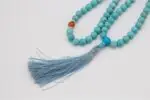 Turquoise Stone Mala – handcrafted 108-bead prayer necklace made from natural turquoise gemstones, symbolizing protection, healing, and spiritual balance. Ideal for meditation, mantra chanting, and energy alignment.