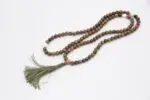 Unakite Stone Mala – handcrafted 108-bead prayer necklace made from natural unakite gemstones, symbolizing emotional healing, balance, and heart chakra activation. Ideal for meditation, mantra chanting, and inner harmony