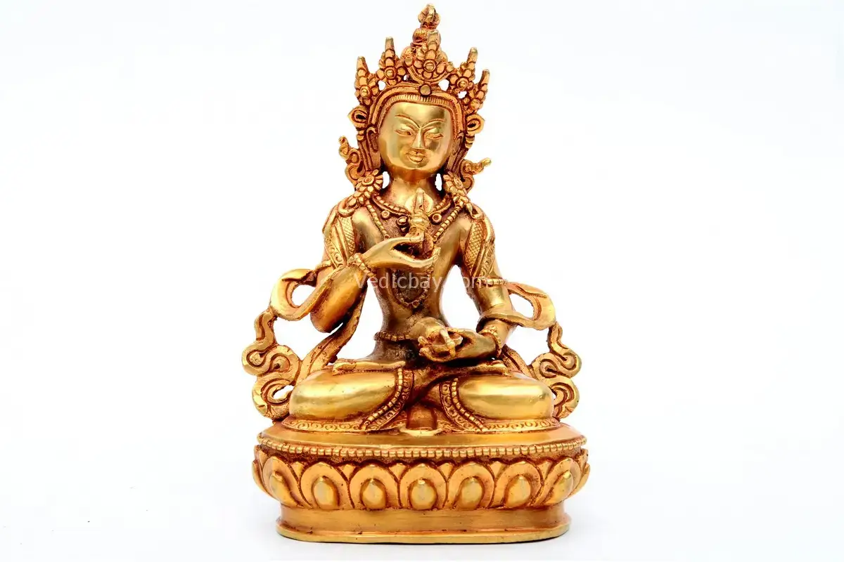 Handmade Vajrasattva Statue seated in meditative posture holding vajra and bell – crafted from brass with intricate details, representing purification and spiritual awakening.