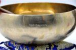 11 inch handmade Tibetan Therapy singing bowl with dim finish – thin wall design for deep immersive sound, includes mallet, felt drum stick, and cushion
