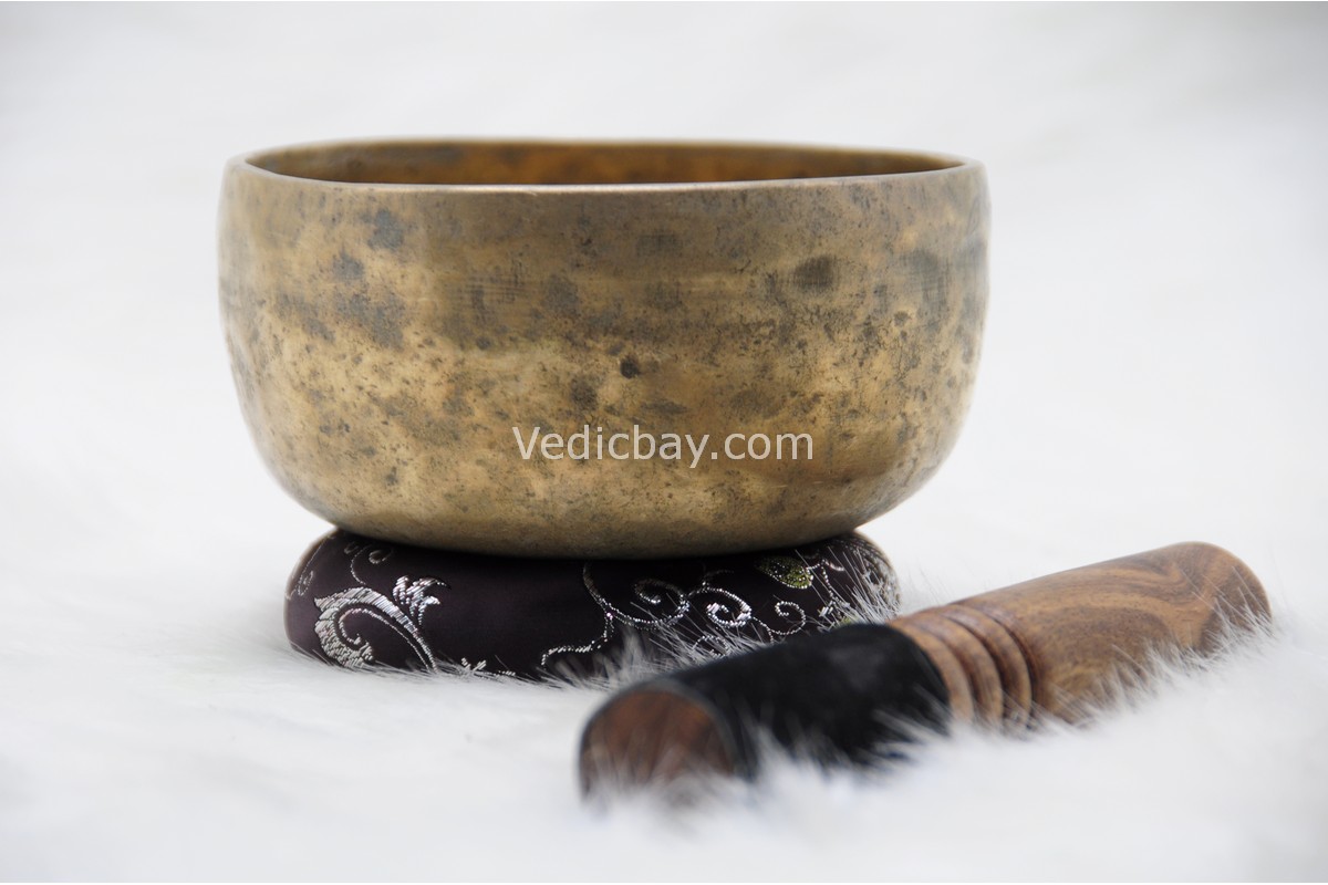 Collected antique Thadobati singing bowl showing natural patina, aged marks, and authentic surface texture