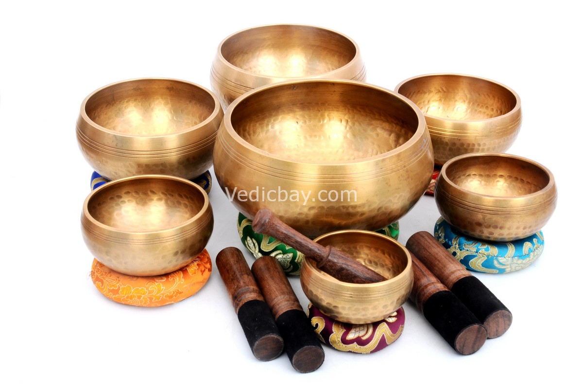 Set of 7 Hand Beaten Chakra Singing Bowls Handmade in Nepal with mallets and cushions