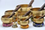 Set of 7 Hand Beaten Chakra Singing Bowls Handmade in Nepal with mallets and cushions
