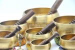 Set of 7 Hand Beaten Chakra Singing Bowls Handmade in Nepal with mallets and cushions