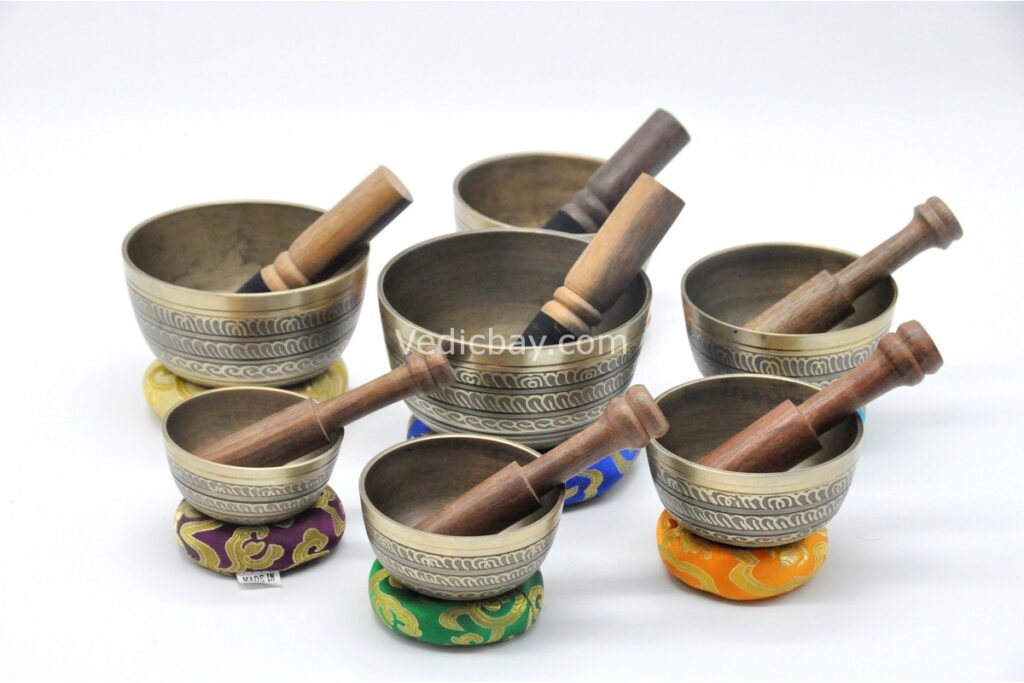 7 Chakra Natural Finish Singing Bowl Set of 7 with mallets, cushions, carry box, and bracelet – handmade in Nepal