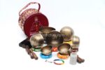 7 Chakra Tibetan Mantra Etched Singing Bowl Set of 7 with mallets, cushions, carry box, and bracelet – handmade in Nepal