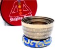 7 Chakra Tibetan Mantra Etched Singing Bowl Set of 7 with mallets, cushions, carry box, and bracelet – handmade in Nepal