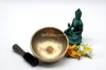 7 inch handmade Tibetan Lingam singing bowl with dim finish – rare Himalayan bowl with central lingam, includes mallet and cushion