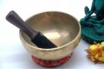 7 inch handmade Tibetan Lingam singing bowl with dim finish – rare Himalayan bowl with central lingam, includes mallet and cushion