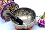 9-Inch Jhumka Full Moon Singing Bowl with mallet, cushion, felt drum stick, and Tibetan silk bag – handmade in Nepal