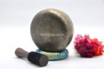 Collected antique Mani singing bowl showing natural patina, aged surface marks, and authentic texture
